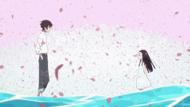 a man and a girl are standing on a cliff with leaves falling around them