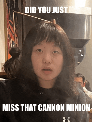 a picture of a girl with a caption that says " did you just miss that cannon minion "