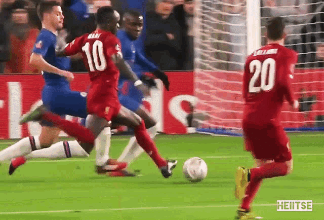 a soccer player with the number 20 on the back of his shirt