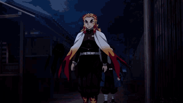 a man in a white cape with red flames on it