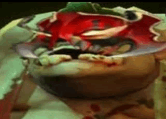 a close up of a painting of a hamburger with blood on it on a table .
