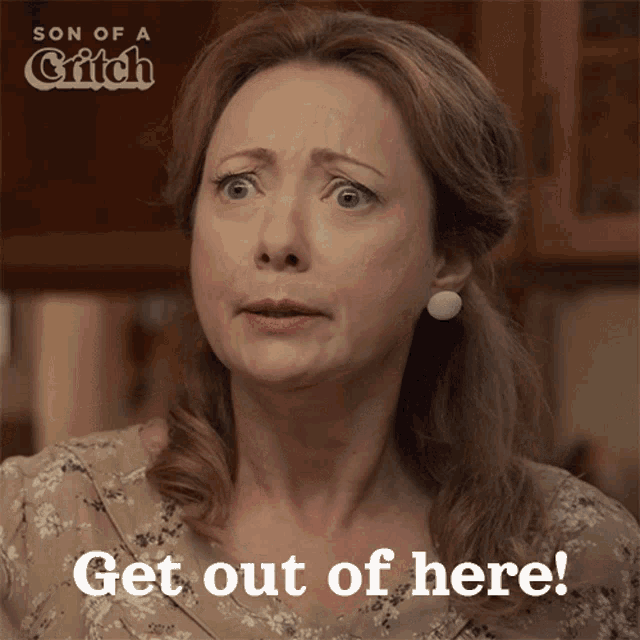 a woman with a surprised look on her face and the words get out of here on the bottom