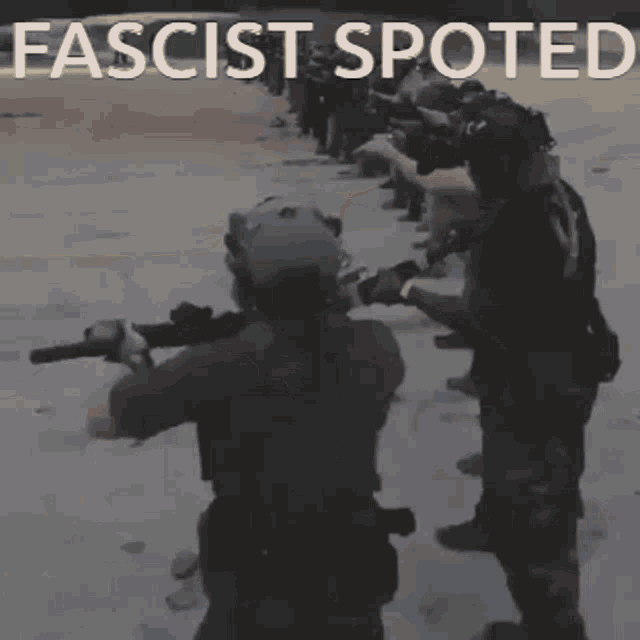 a group of men holding guns with the words " fascist spotted " written above them
