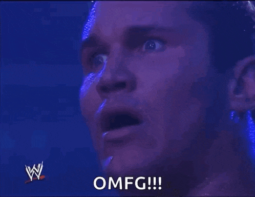 a man with a surprised look on his face and the word omfg on the bottom right