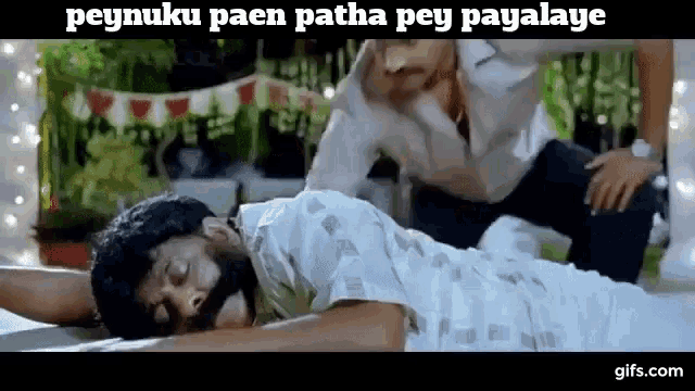 a man with a beard is laying on the ground with a caption that says peynuku paen patha pey payalaya .