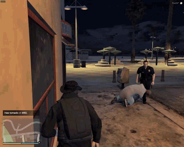 a screenshot of a video game shows a man laying on the ground and a police officer standing behind him