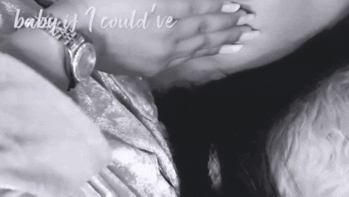 a black and white photo of a woman covering her mouth with her hand and the words baby is i could ve
