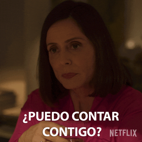 a woman in a pink shirt says " puedo contar contigo " in spanish