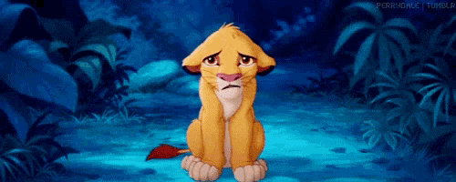 a lion cub from the lion king is sitting down in the jungle with a sad look on his face .