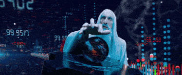 a man with a beard is holding a globe in front of a screen with numbers on it including the number 72 4708