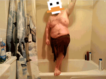 a man in a bathtub with a duck head on his head