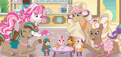 a group of ponies are gathered around a table playing with stuffed animals
