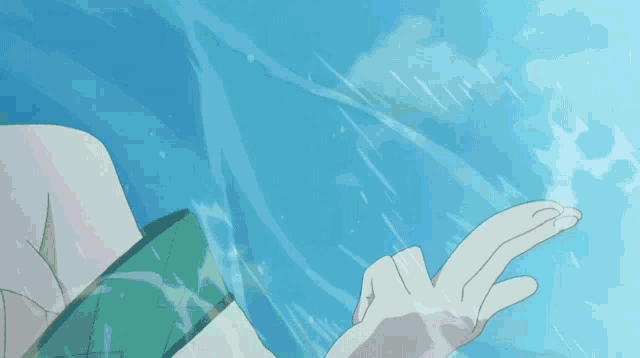 a person in a white robe is surrounded by a sphere of water