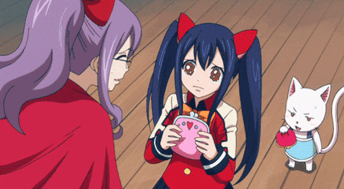 a girl in a red jacket is holding a pink purse with hearts on it