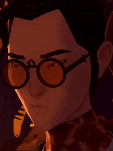 a close up of a person 's face wearing glasses