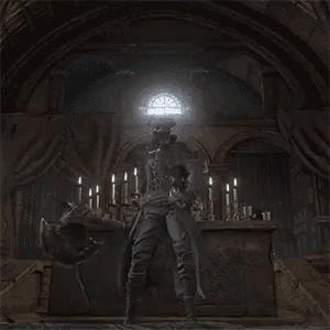 a man is standing in a dark room holding a cross .