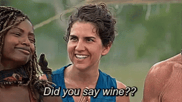 a group of people are standing next to each other and one of them is holding a lizard and asking did you say wine ?