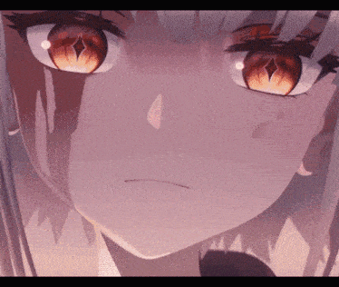 a close up of a girl 's face with a diamond in her eye