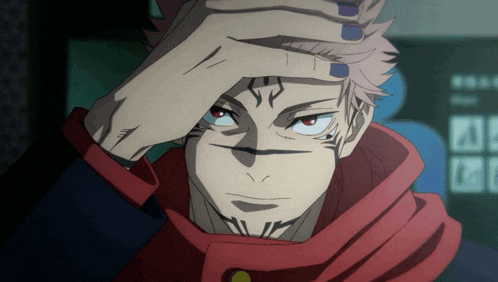 a close up of a man 's face with a hand on his forehead