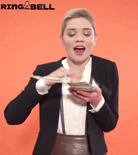 a woman is holding a bunch of money in front of an orange background that says ring the bell on it