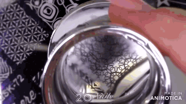 a close up of a stamp with the words 20 nails on it