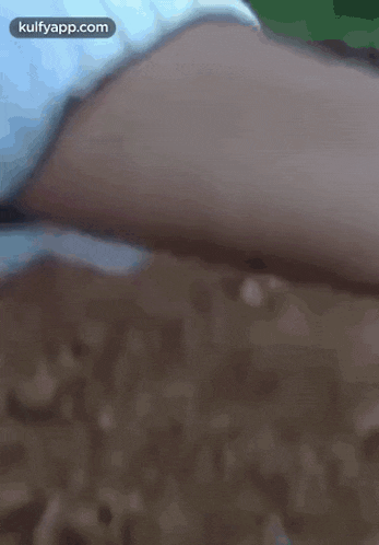 a close up of a woman 's face with a serious look on her face