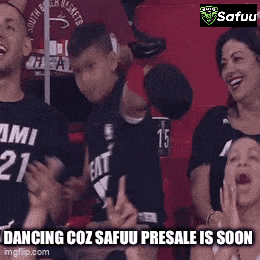 a group of people sitting in a stadium with a caption that says dancing coz safuu presale is soon .