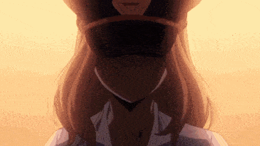 a close up of a woman wearing a hat .