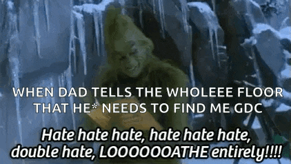 a picture of a grinch holding a book in front of a snowy mountain with ice .
