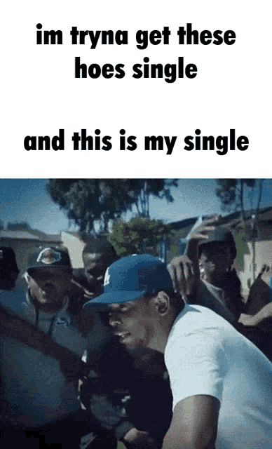 a man in a baseball cap says im tryna get these hoes single and this is my single in front of a group of people