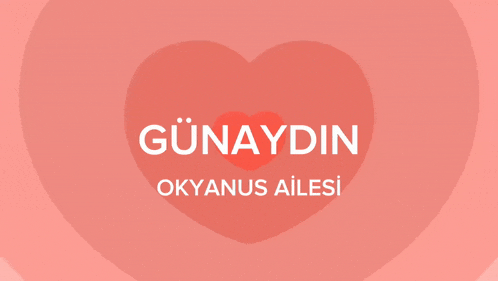 a pink heart with the words günaydin okyanus ailesi written on it