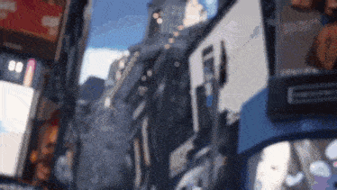 a blurred image of a city street with a sign that says ff on it