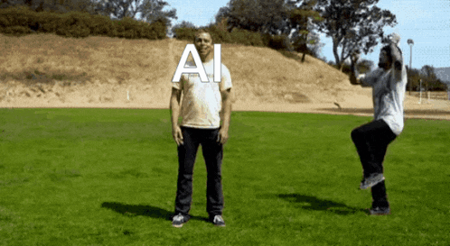 two men are standing in a grassy field with the word ai written above them