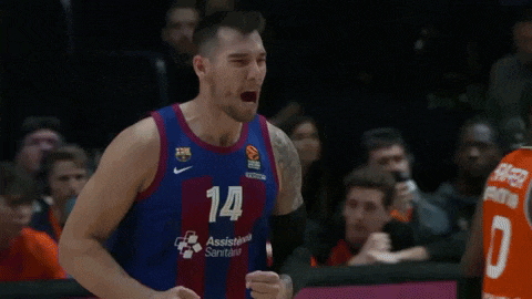 a basketball player wearing a jersey that says 14 on it
