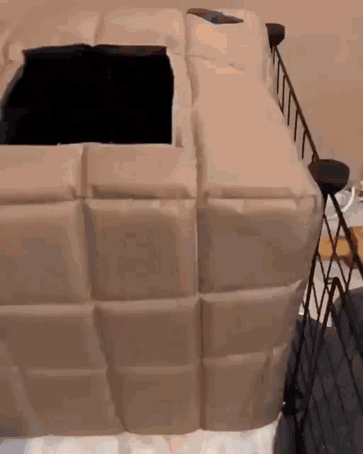 a large piece of cardboard with a hole in it
