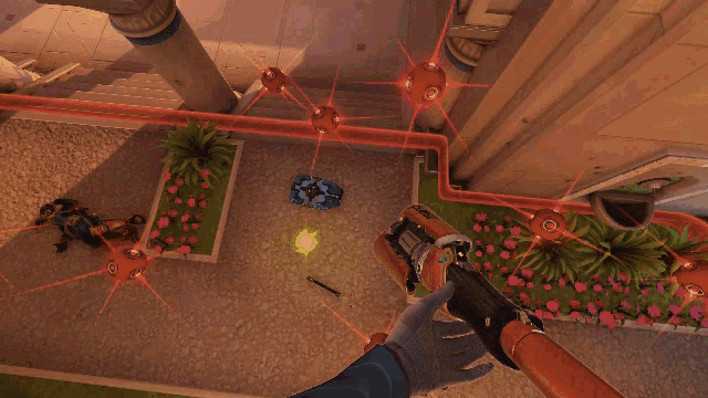 a video game is being played in a courtyard with a fountain