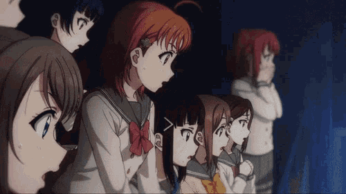 a group of anime girls are standing in a line