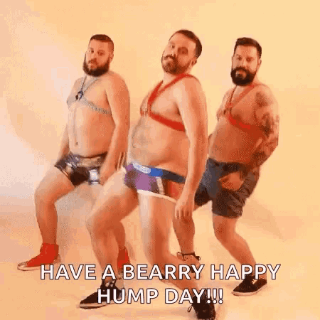 three bearded men are dancing in underwear and a harness .