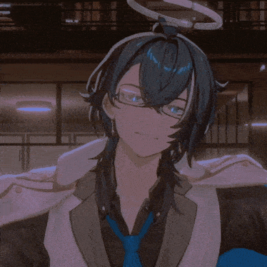a man with long black hair and glasses is wearing a suit and tie