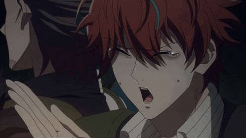 a close up of a person with red hair making a face
