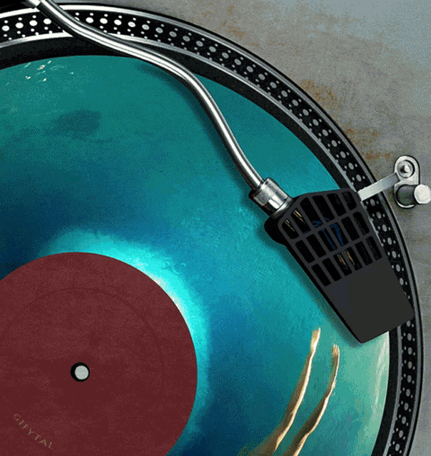 a turntable with a record on it that says city tal