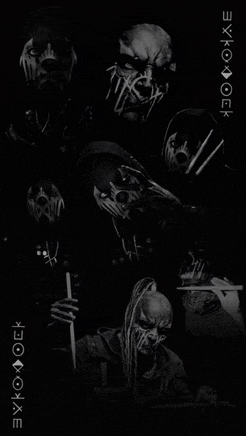 a black and white photo of a group of people standing next to each other on a black background .