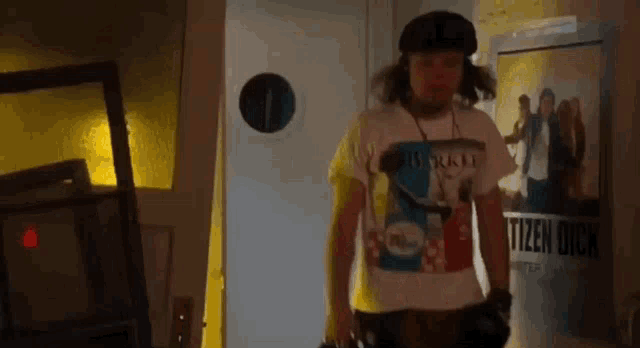 a man wearing a t-shirt that says ' citizen dick '