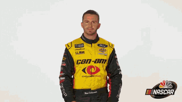 a man in a yellow and black racing suit says happy valentine 's day