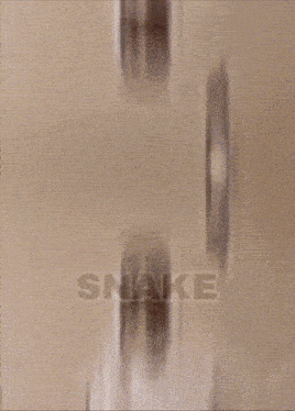 a man in a white robe is standing in front of a door