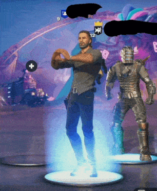 a man in a gray shirt is standing next to a statue of a man in armor