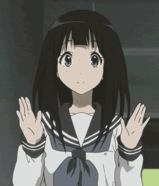 a girl in a school uniform is waving her hands in the air