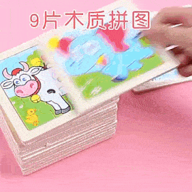 a stack of puzzles with a picture of a cow on one of them