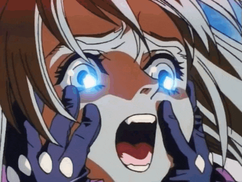a close up of a girl 's face with her mouth open
