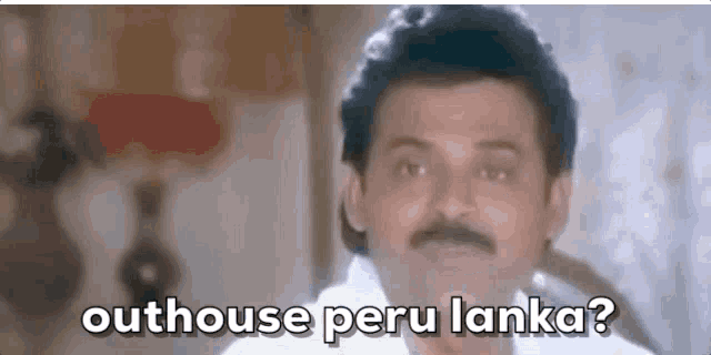a man with a mustache is standing in front of a lamp and says `` outhouse peru lanka ? ''